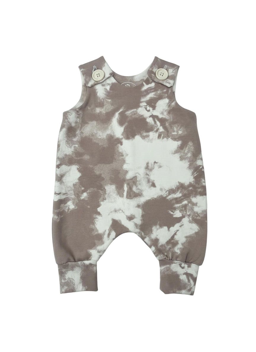 Tie Dye cream and wine colored baby romper with button closures on a white background. Designed with room to grow for longer wear
